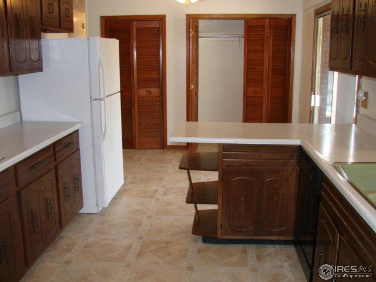 4433 County Line Road Erie, CO 80516 - Photo 5 of 11 a bathroom with a sink and a mirror
