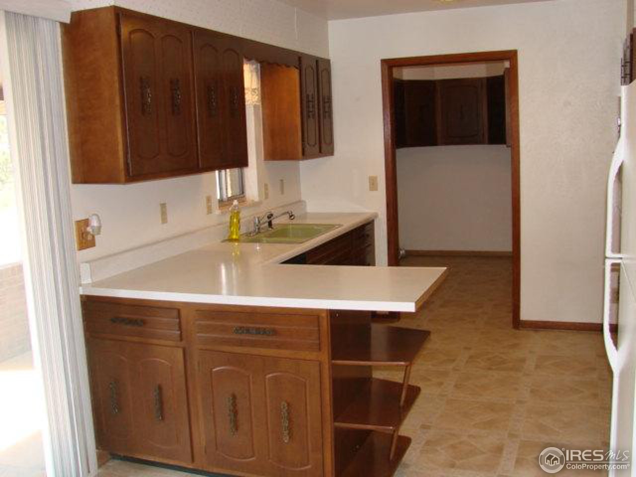 4433 County Line Road Erie, CO 80516 - Photo 10 of 11 a bathroom with a sink and a mirror