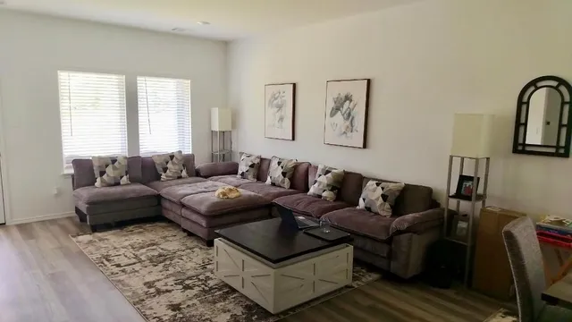 a living room with furniture and a couch