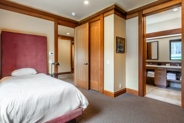 a bathroom with a shower and a sink