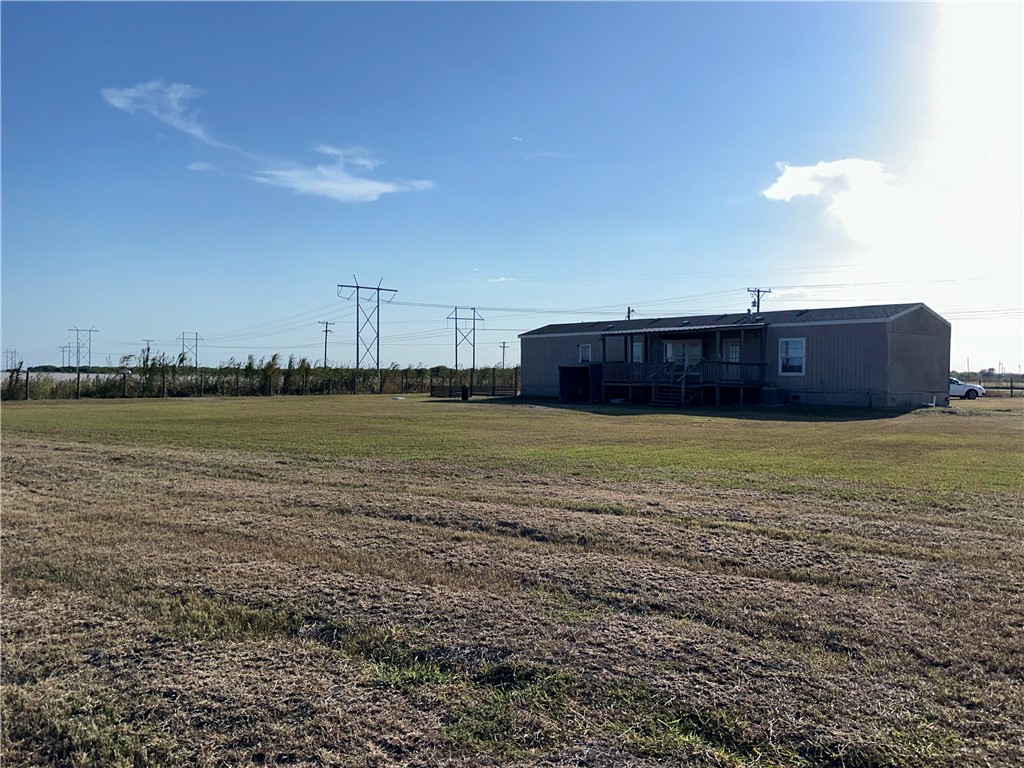 Undisclosed Address Robstown, TX 78380 - Photo 2 of 17 a view of a swimming pool and an outdoor space