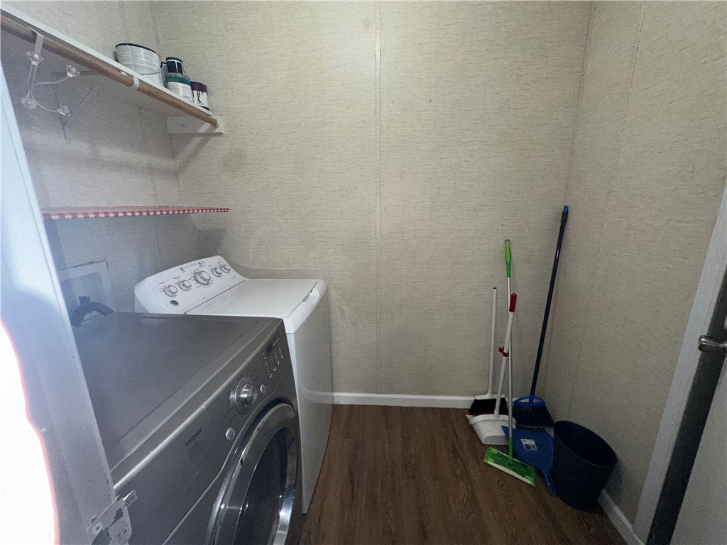 Undisclosed Address Robstown, TX 78380 - Photo 7 of 17 a utility room with dryer and washer