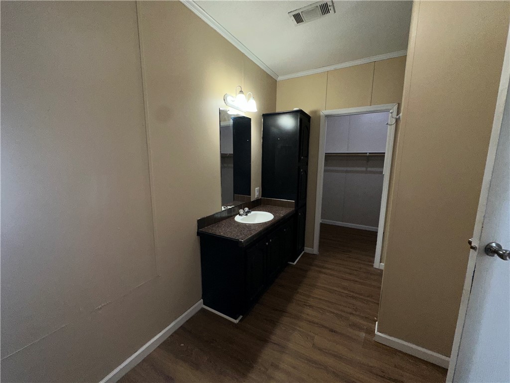 Undisclosed Address Robstown, TX 78380 - Photo 9 of 17 a bathroom with a sink and a mirror