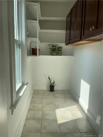 a view of entryway with bathroom
