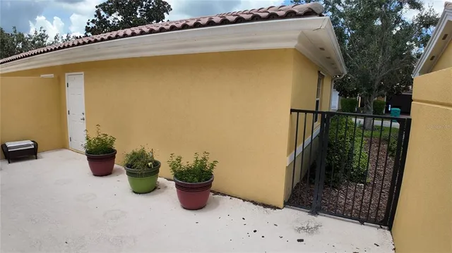 a view of a livingroom with furniture and a window