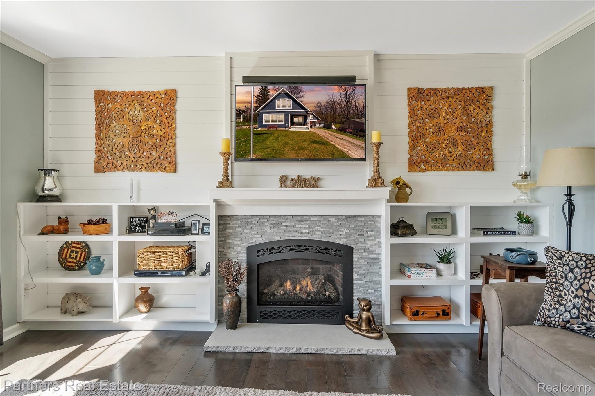 16051 Murray Road Byron, MI 48418 - Photo 16 of 41 Um, yes please!! Shiplap, gorgeous fireplace, stunning lake view, Check!!
