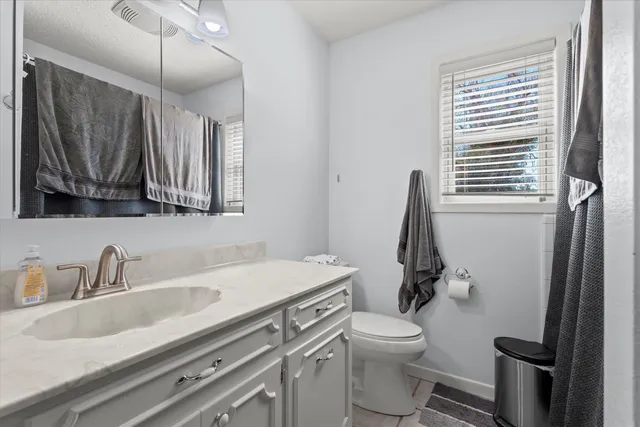 a view of hallway with windows