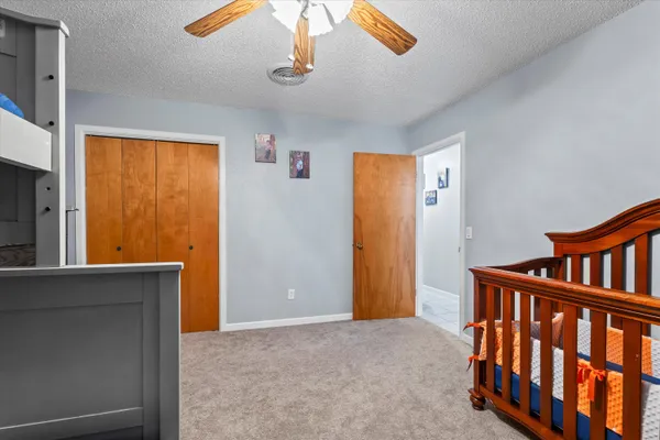 a view of hallway with windows