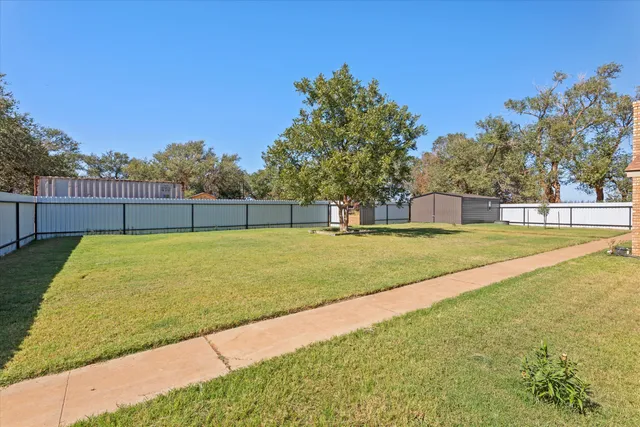 a house view with a garden space