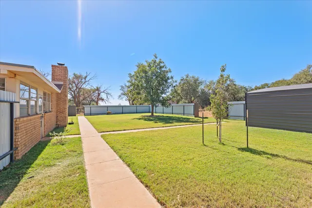 a view of a lake with a big yard