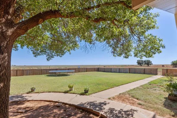 a view of a lake with a big yard