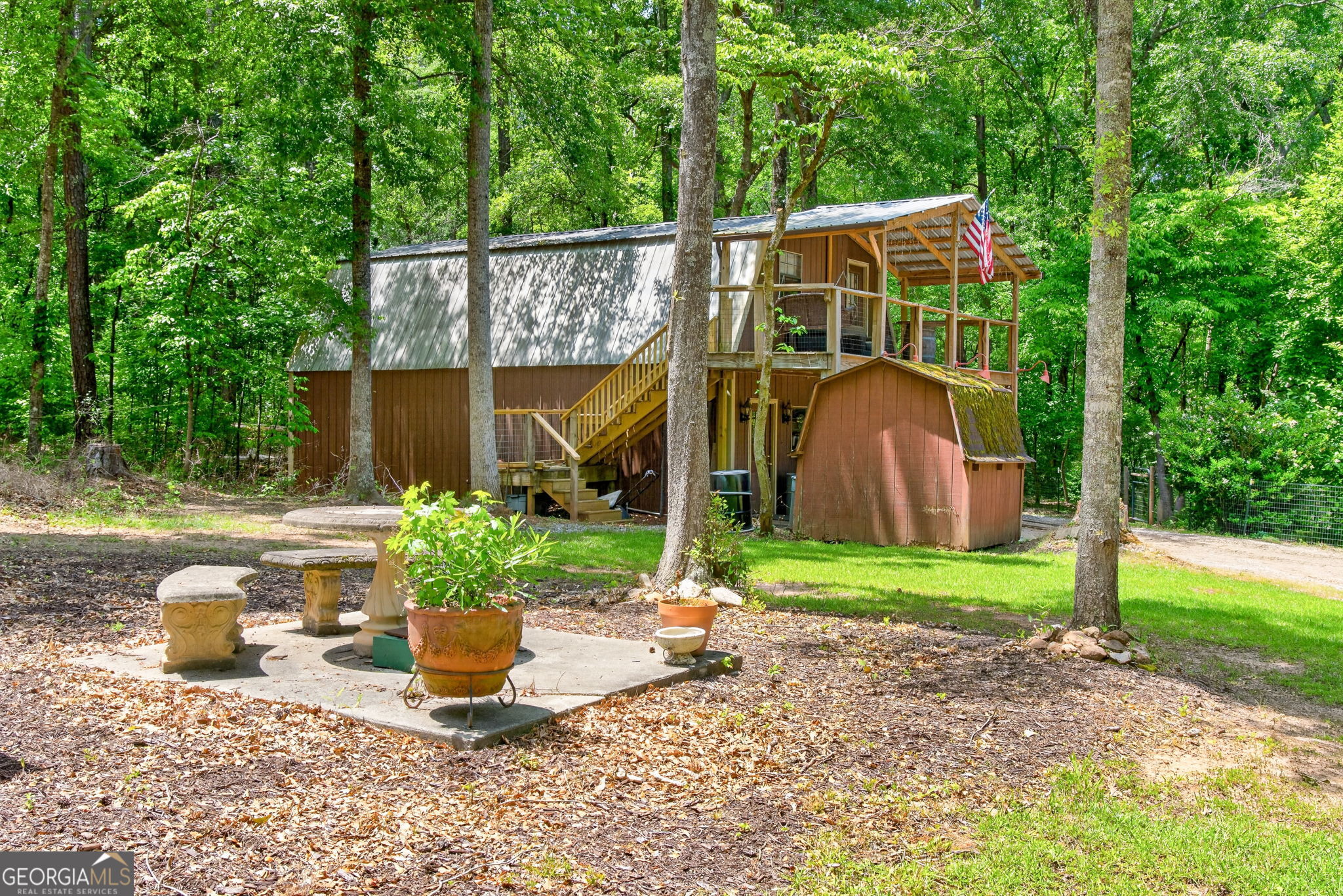 261 McIntosh Circle Jackson, GA 30233 - Photo 51 of 77 a garden view with a seating space