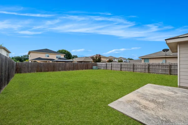 a view of a backyard with a garden