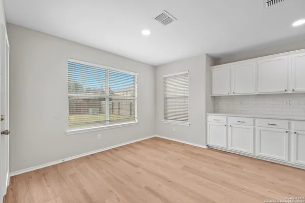 a view of a kitchen with marble kitchen and sink