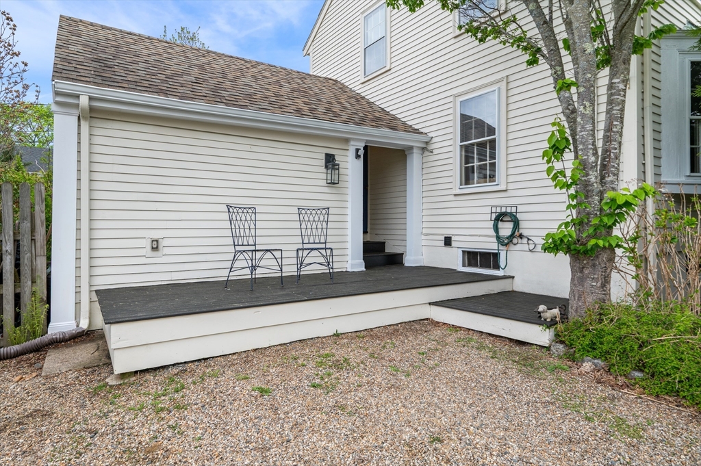 26 Pickwick Road Marblehead, MA 01945 - Photo 4 of 40 a view of a backyard with sitting area