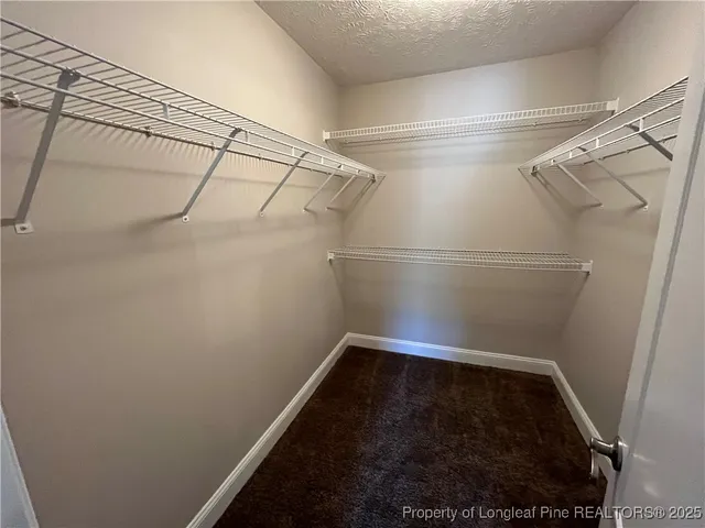 a view of a room with racks on the wall