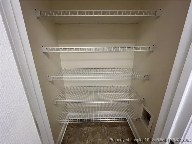 a view of small space with racks on the wall