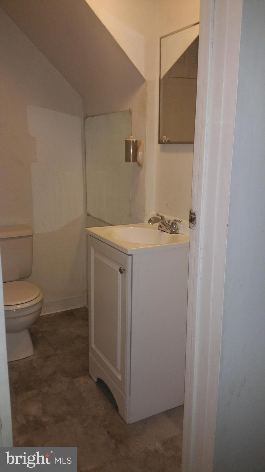 1640 Riverwood Road Essex, MD 21221 - Photo 21 of 22 Downstairs Full Bath/new floor/vanity/ref tub