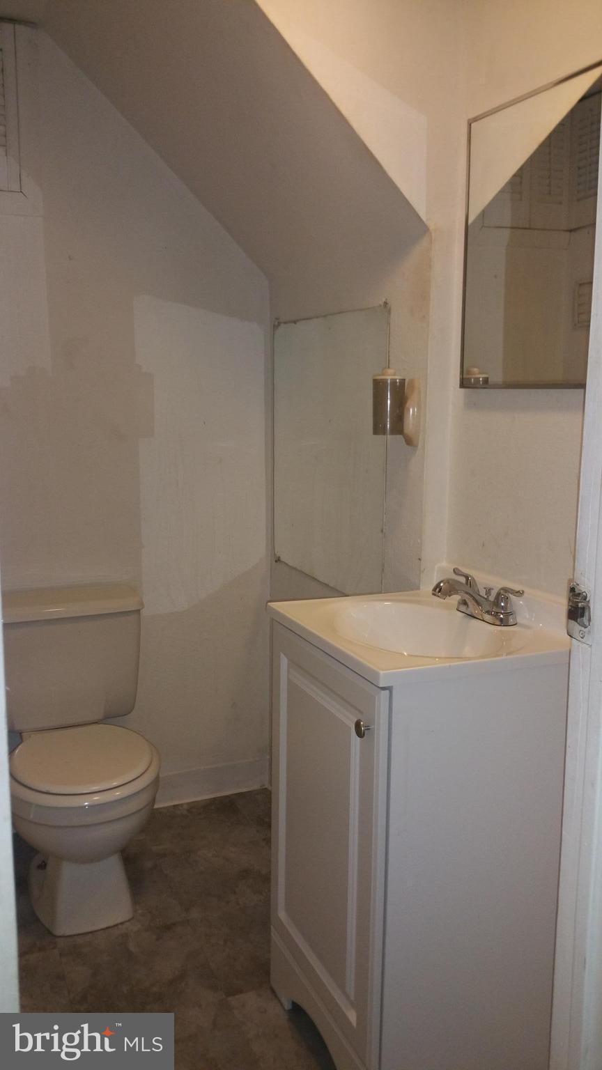 1640 Riverwood Road Essex, MD 21221 - Photo 22 of 22 Downstairs full bath/new floor, vanity/ref tub