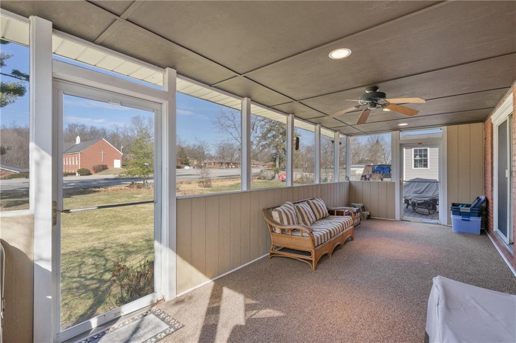 520 Nichols Road Pittsburgh, PA 15237 - Photo 12 of 31 a living room with furniture and a large window