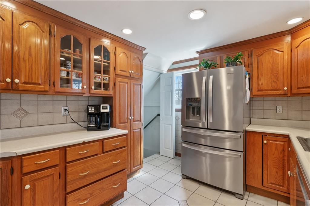 520 Nichols Road Pittsburgh, PA 15237 - Photo 20 of 31 a kitchen with stainless steel appliances granite countertop a refrigerator and cabinets