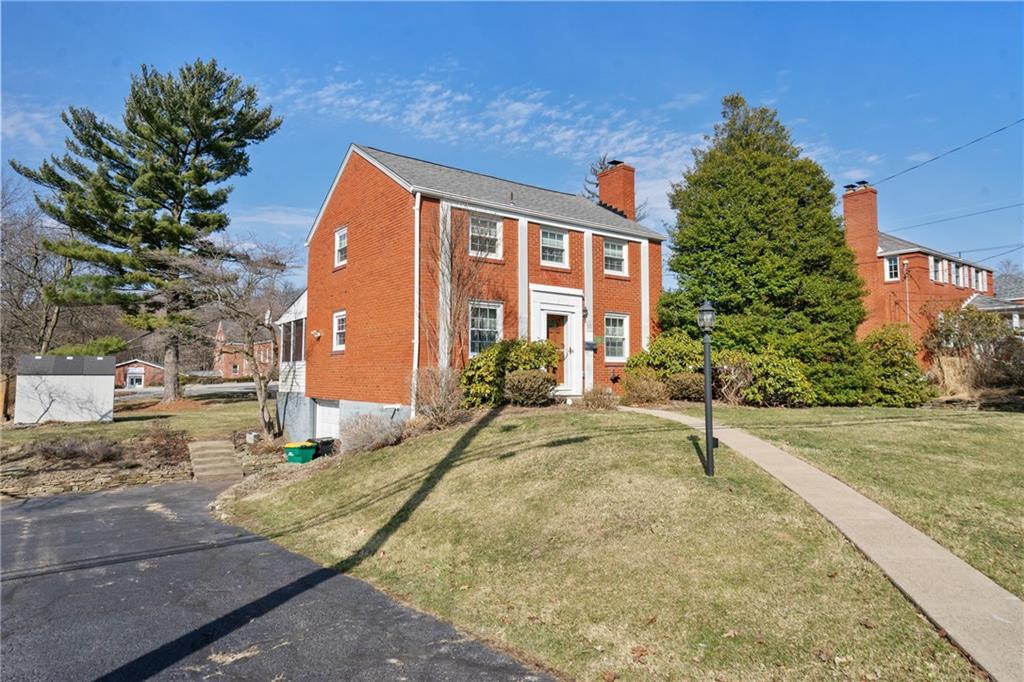 520 Nichols Road Pittsburgh, PA 15237 - Photo 2 of 31 a view of a house with backyard and trees
