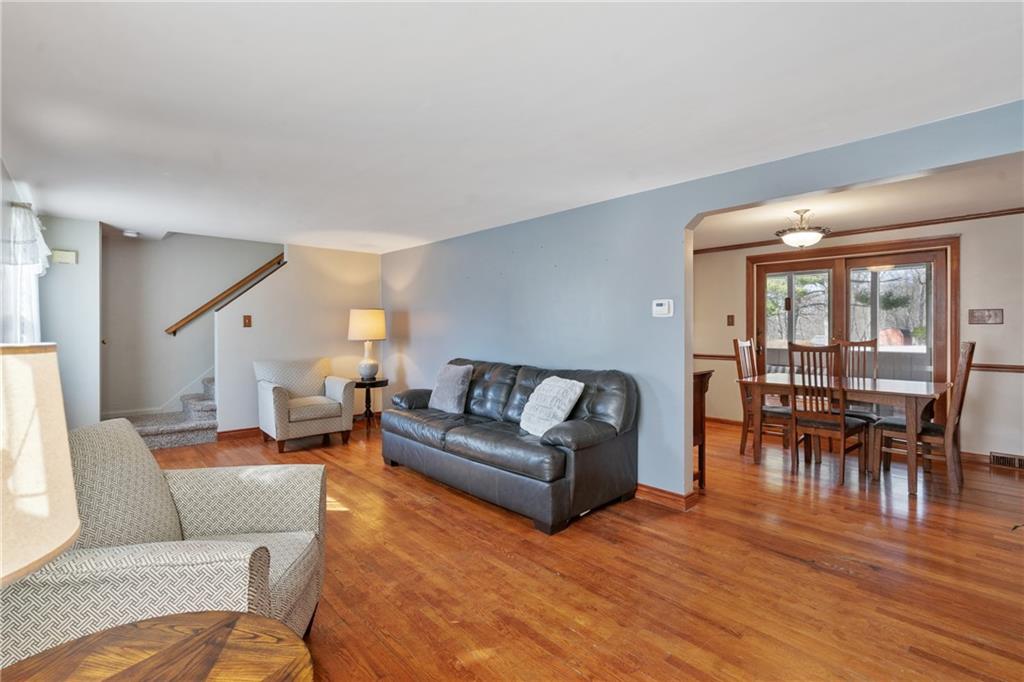 520 Nichols Road Pittsburgh, PA 15237 - Photo 4 of 31 a living room with furniture and a wooden floor
