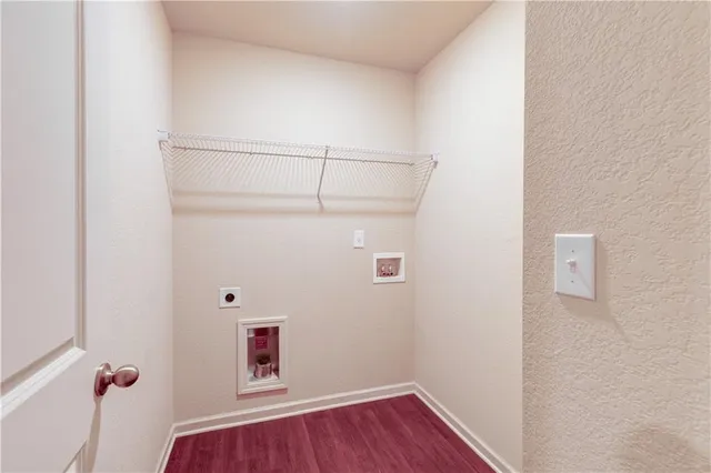 a room with a hardwood and a ceiling fan