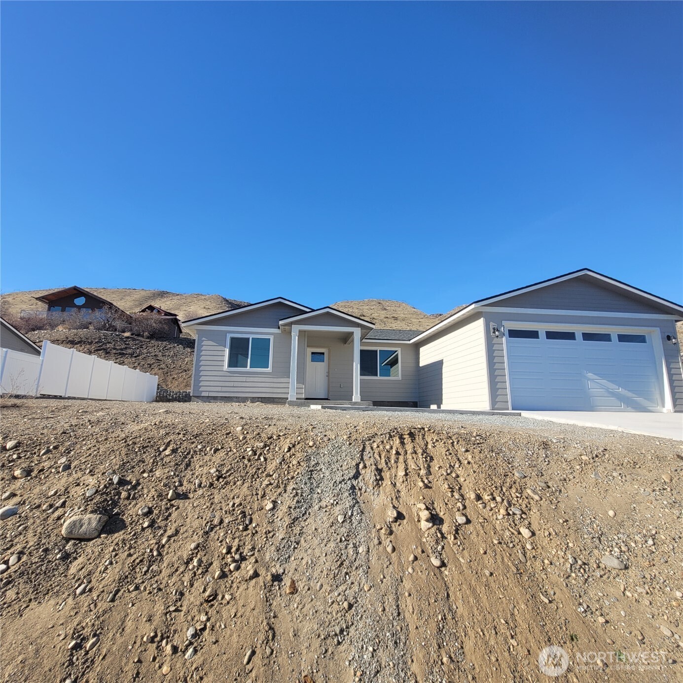 356 Ives Street Pateros, WA 98846 - Photo 1 of 1 a front view of a house with a yard