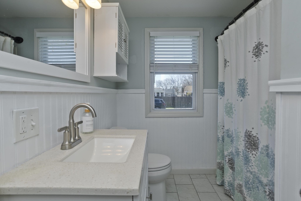 43 Rochester Street Chicopee, MA 01020 - Photo 22 of 38 a bathroom with a sink toilet and shower