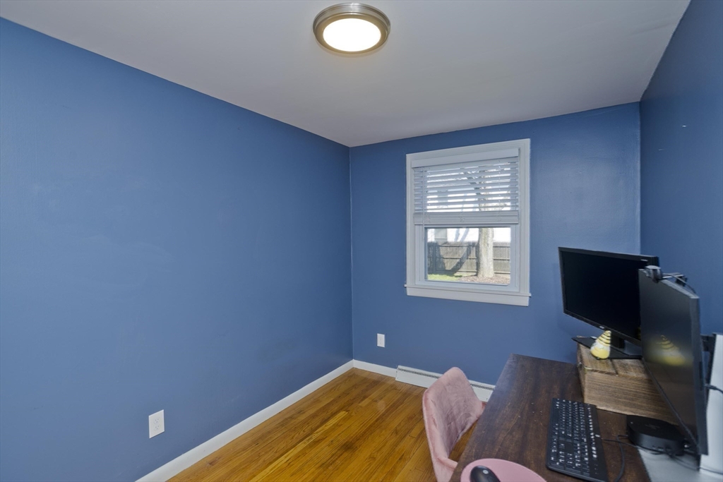 43 Rochester Street Chicopee, MA 01020 - Photo 29 of 38 a living room with furniture and a flat screen tv