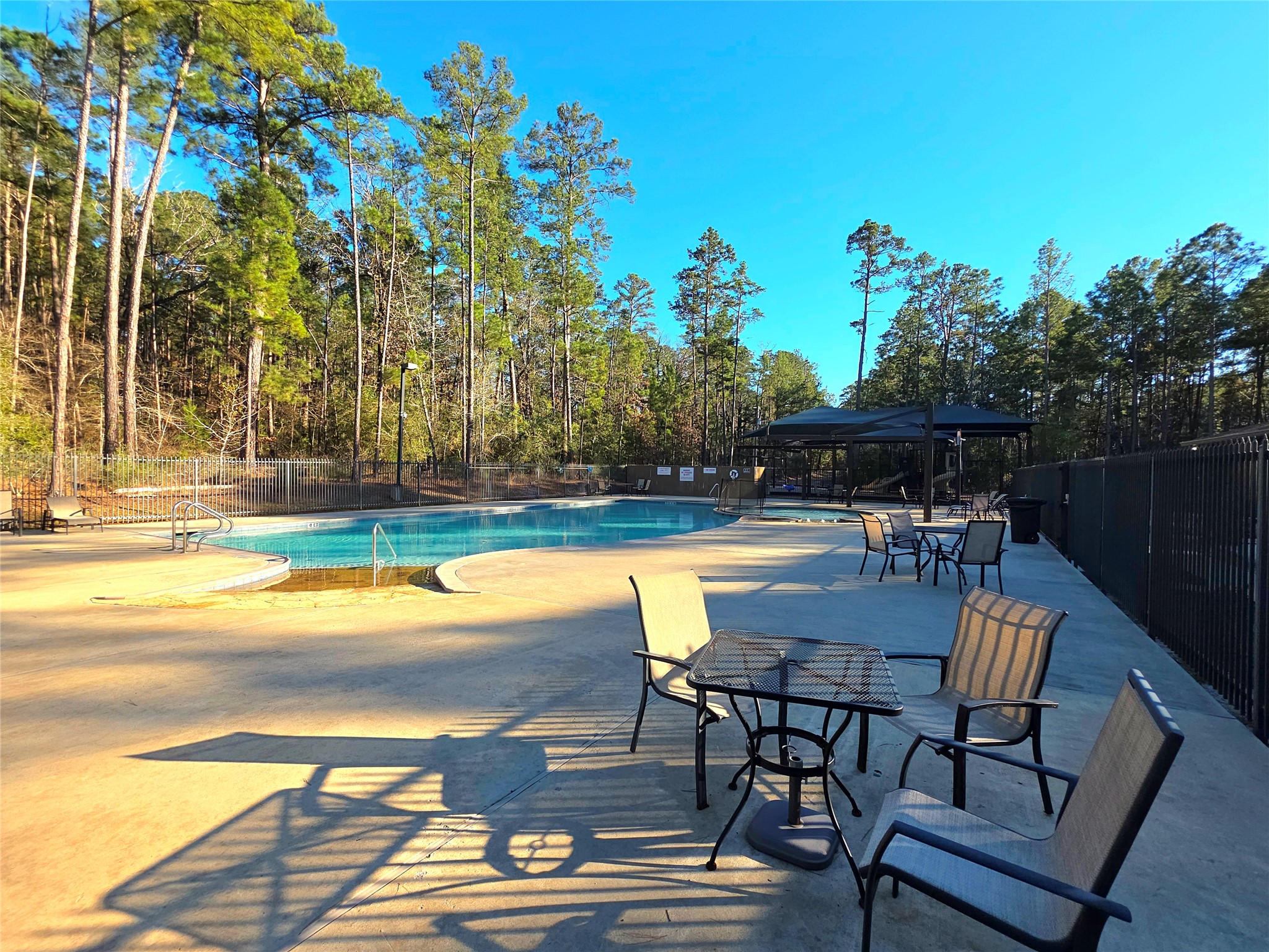 Tbd Tbd Waterwood Bay Road Point Blank, TX 77364 - Photo 11 of 16 a view of a swimming pool with lounge chair