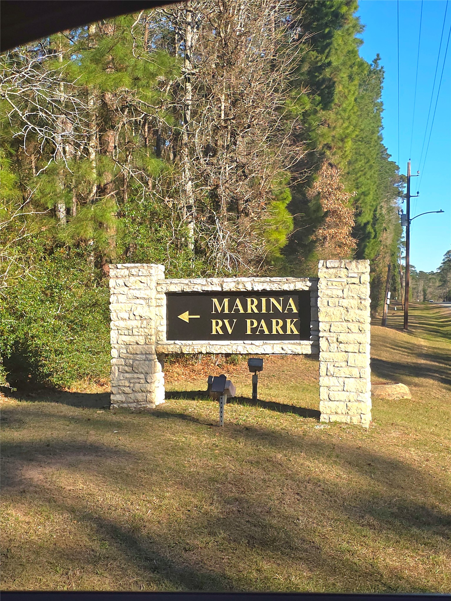 Tbd Tbd Waterwood Bay Road Point Blank, TX 77364 - Photo 15 of 16 a sign board with parking space