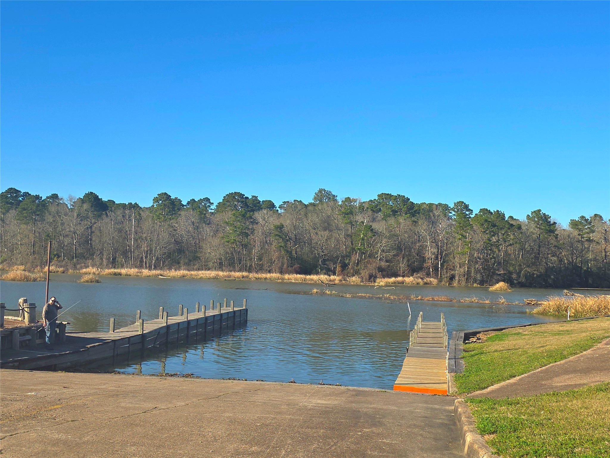 Tbd Tbd Waterwood Bay Road Point Blank, TX 77364 - Photo 16 of 16 a view of a lake with houses in the back