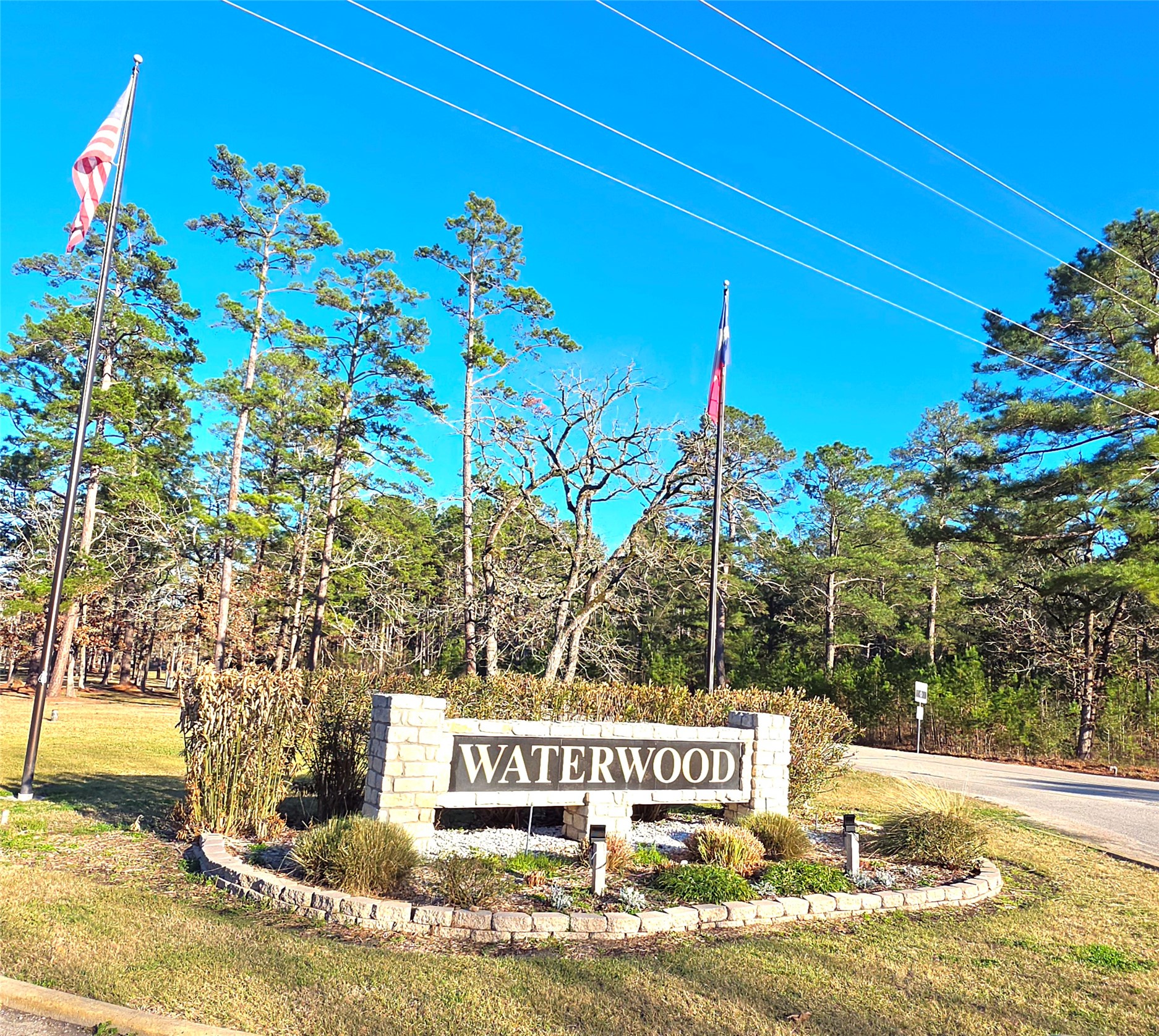 Tbd Tbd Waterwood Bay Road Point Blank, TX 77364 - Photo 2 of 16 a view of a with white house with a yard