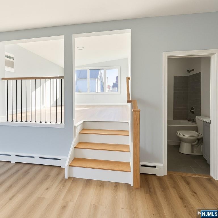 42 Lester Street Wallington, NJ 07057 - Photo 3 of 9 a view of entryway and hall with wooden floor