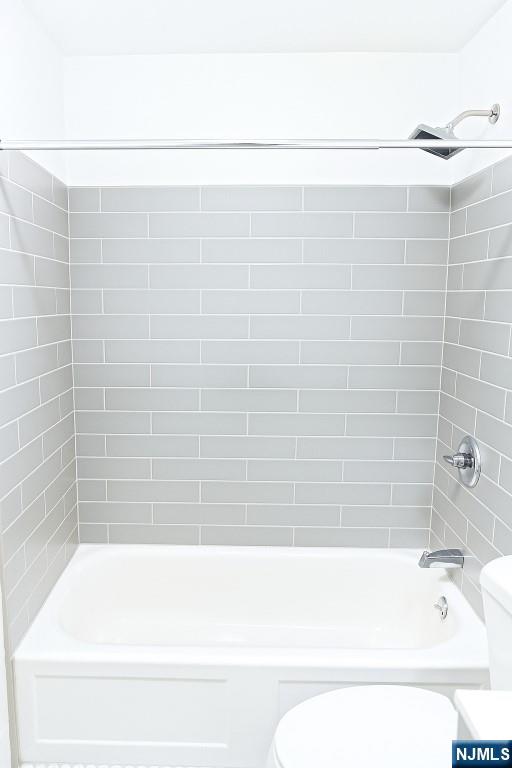 42 Lester Street Wallington, NJ 07057 - Photo 5 of 9 a bathroom with a bathtub