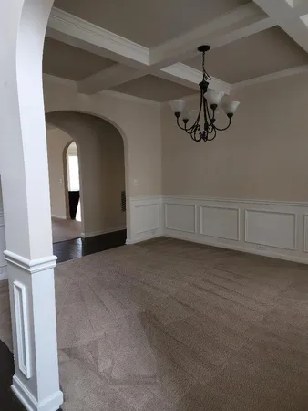 a view of a livingroom with a staircase