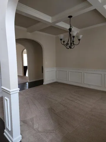 a view of a livingroom with a staircase