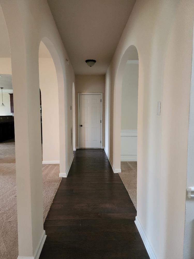 11 Landings Drive Fort Mitchell, AL 36856 - Photo 9 of 31 a view of a hallway with wooden floor and staircase