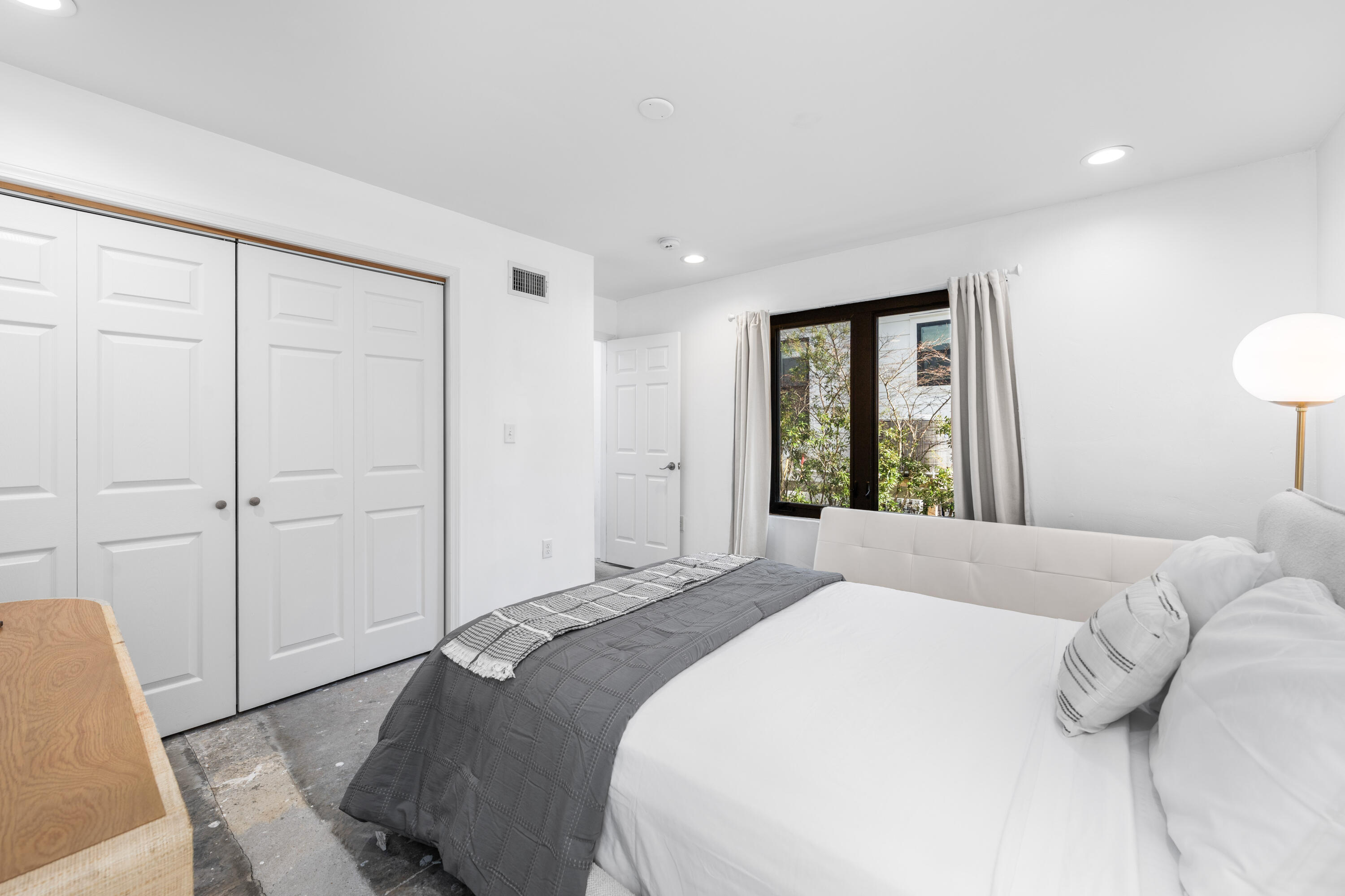 149 Native Tree Lane Santa Rosa Beach, FL 32459 - Photo 16 of 52 a bedroom with a large bed and a window