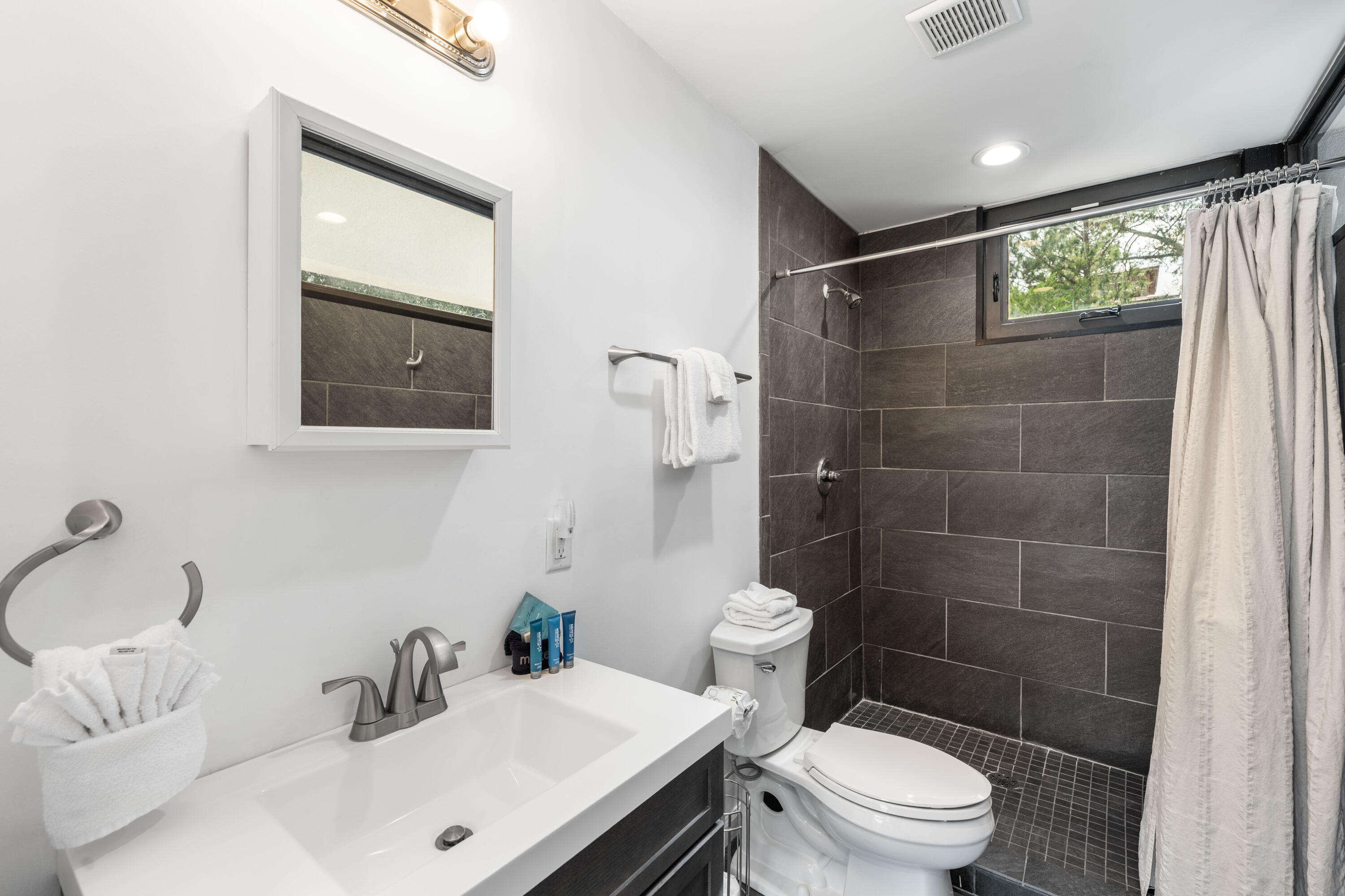 149 Native Tree Lane Santa Rosa Beach, FL 32459 - Photo 20 of 52 a bathroom with a sink toilet and shower