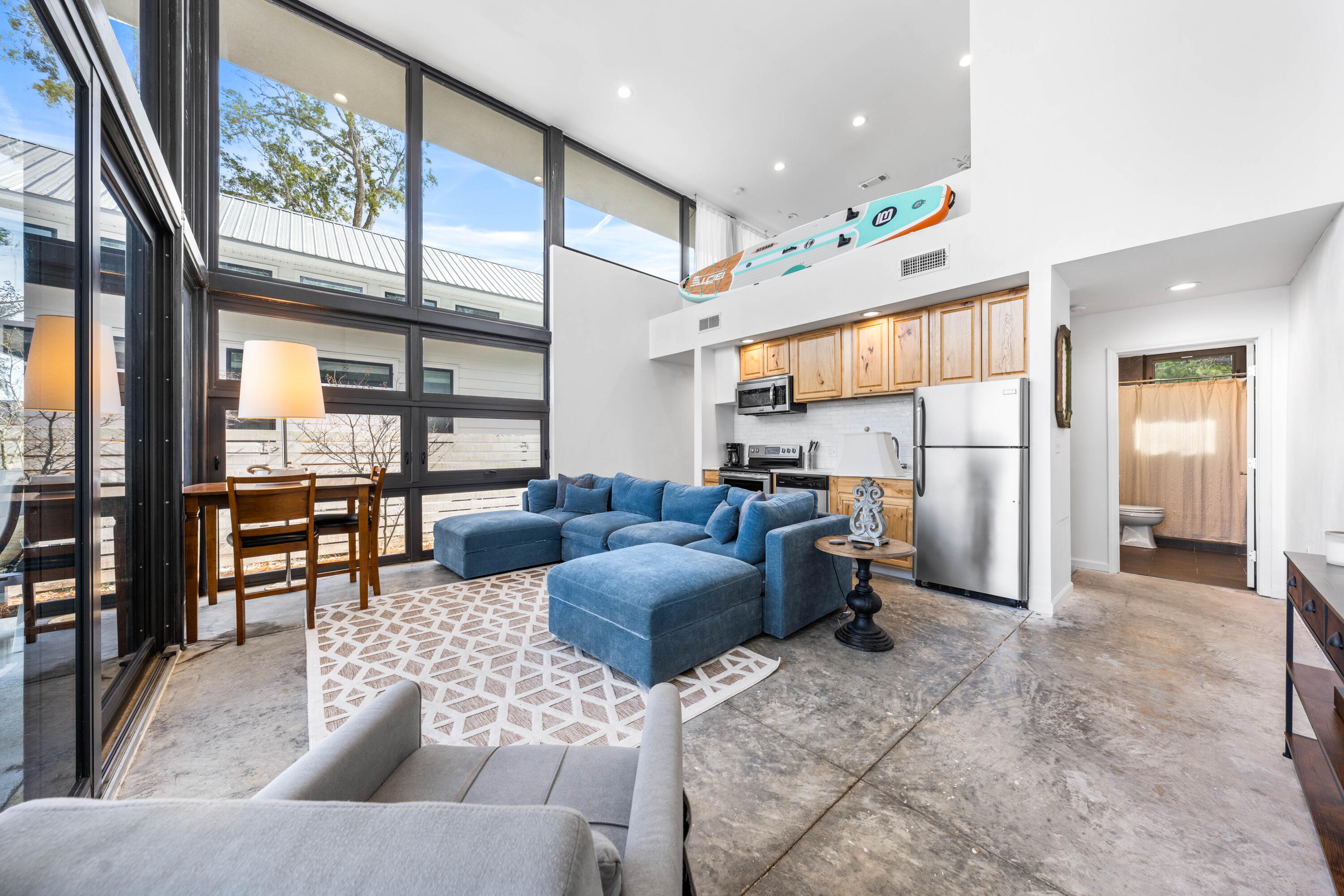 149 Native Tree Lane Santa Rosa Beach, FL 32459 - Photo 8 of 52 a living room with furniture and a large window