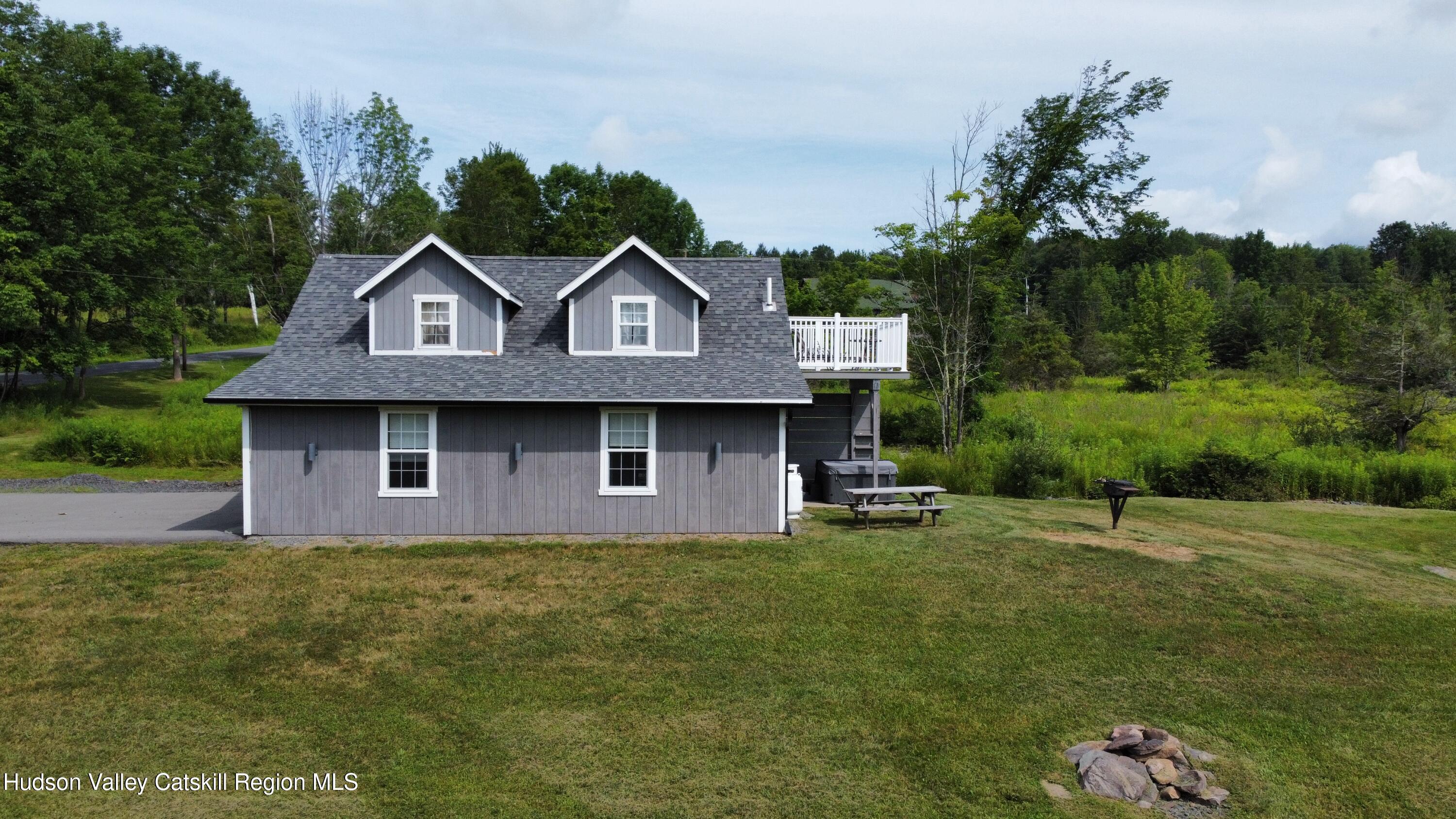 462 Dent Road Prattsville, NY 12468 - Photo 24 of 32 a house view with a garden space