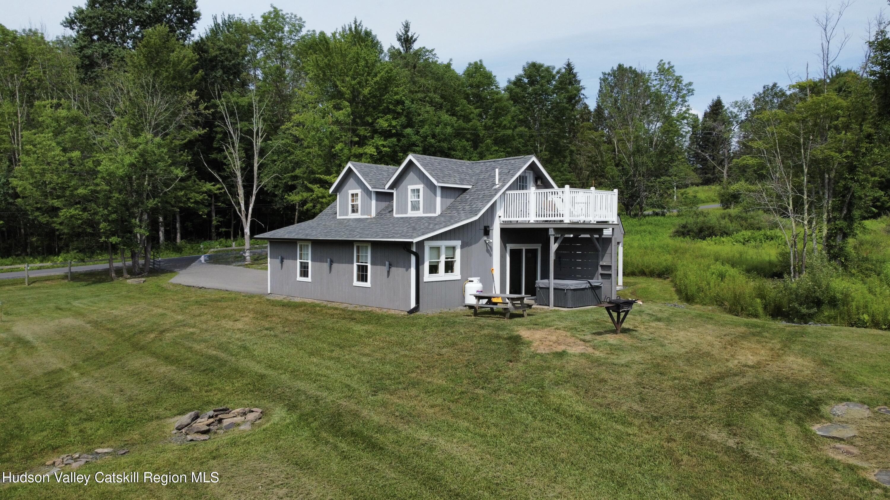 462 Dent Road Prattsville, NY 12468 - Photo 25 of 32 a front view of a house with garden