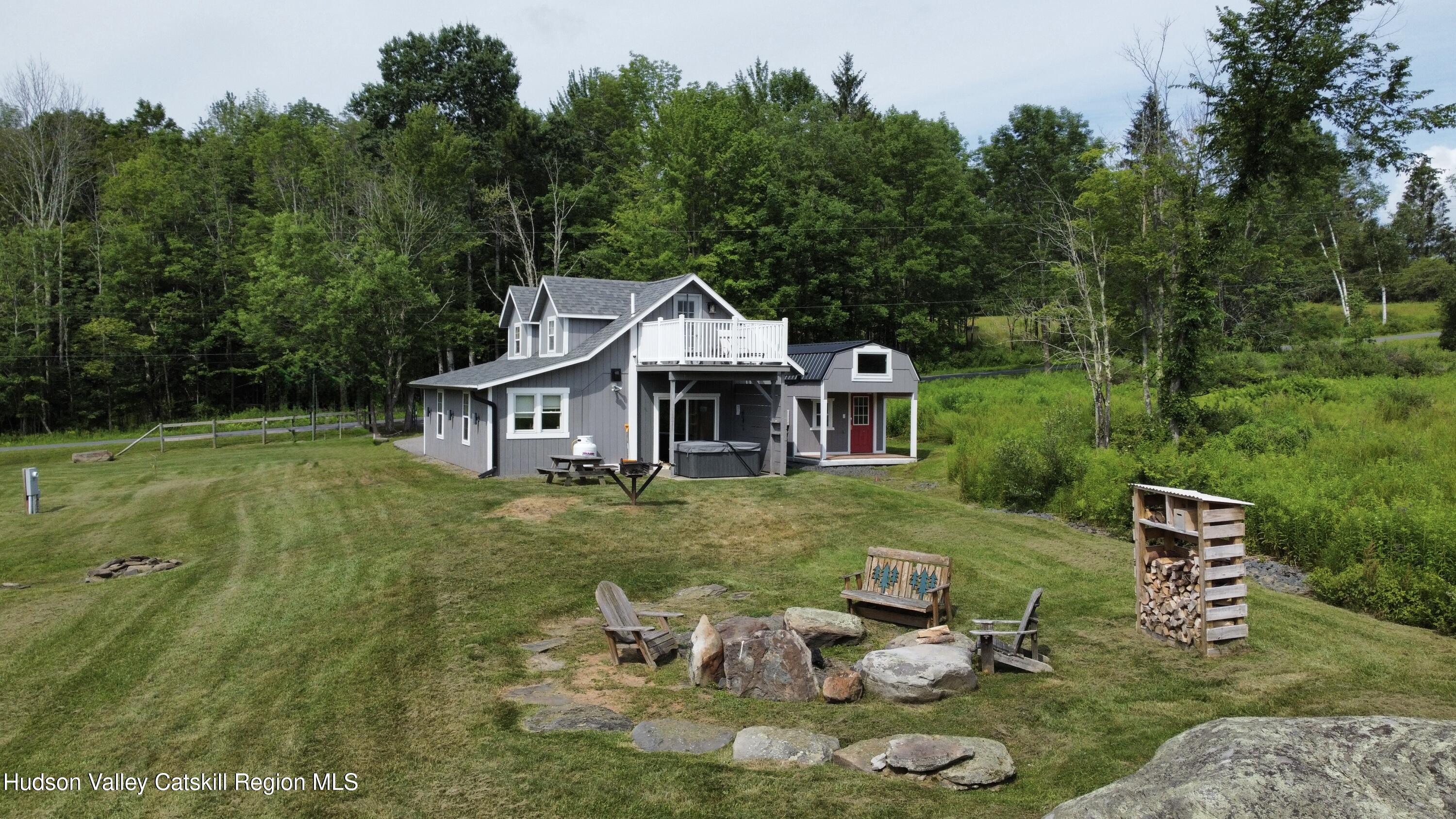 462 Dent Road Prattsville, NY 12468 - Photo 26 of 32 a front view of a house with garden