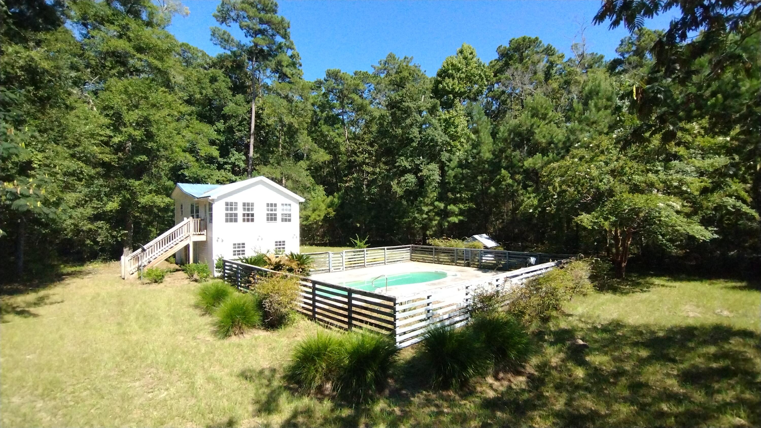 8615 Raccoon Island Road Edisto Island, SC 29438 - Photo 25 of 69 pool and pool house from deck