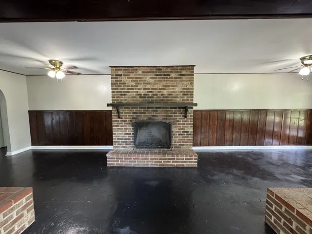 a living room with a fireplace
