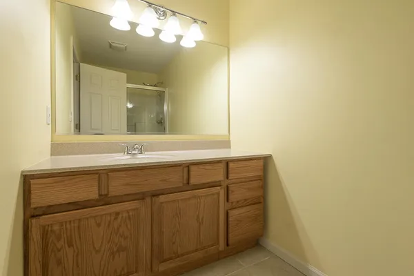 a bathroom with a shower and a toilet