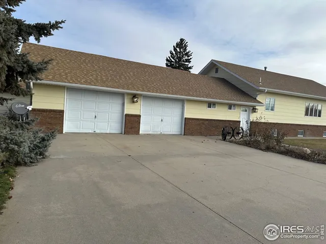 front view of a house with a garage